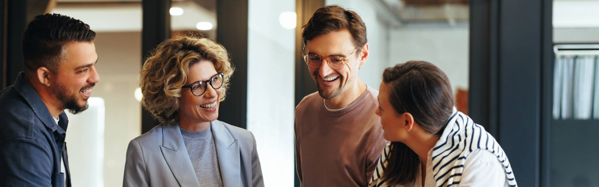 Group of smiling people in an office